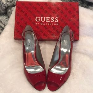 Red patent leather peep toe Guess pumps
